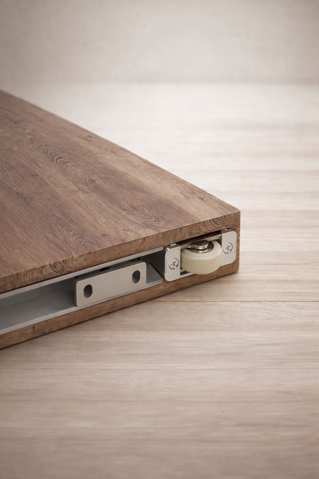 Architectural invisible sliding floor guide roller system by Rustic Luxe Designs.