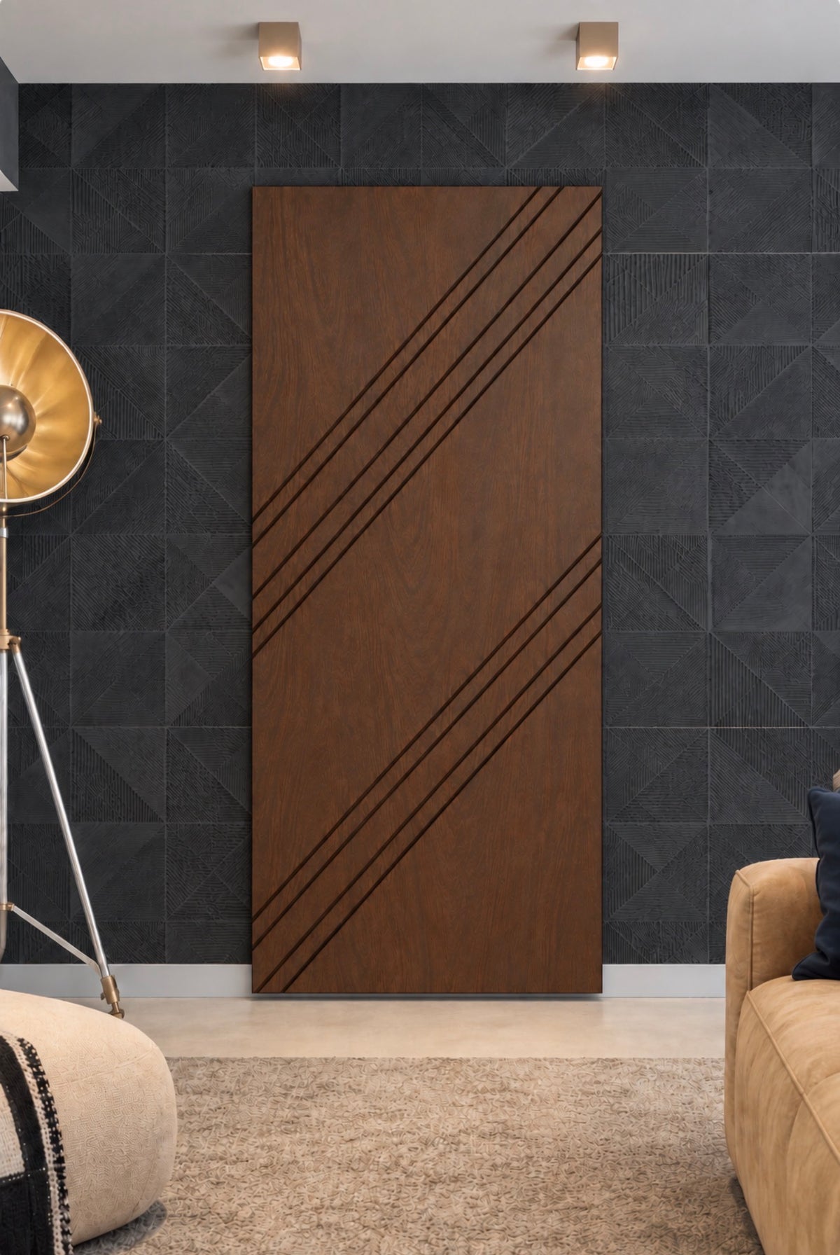 Custom walnut sliding interior door with diagonal routed detailing installed against a black feature wall by Rustic Luxe Designs