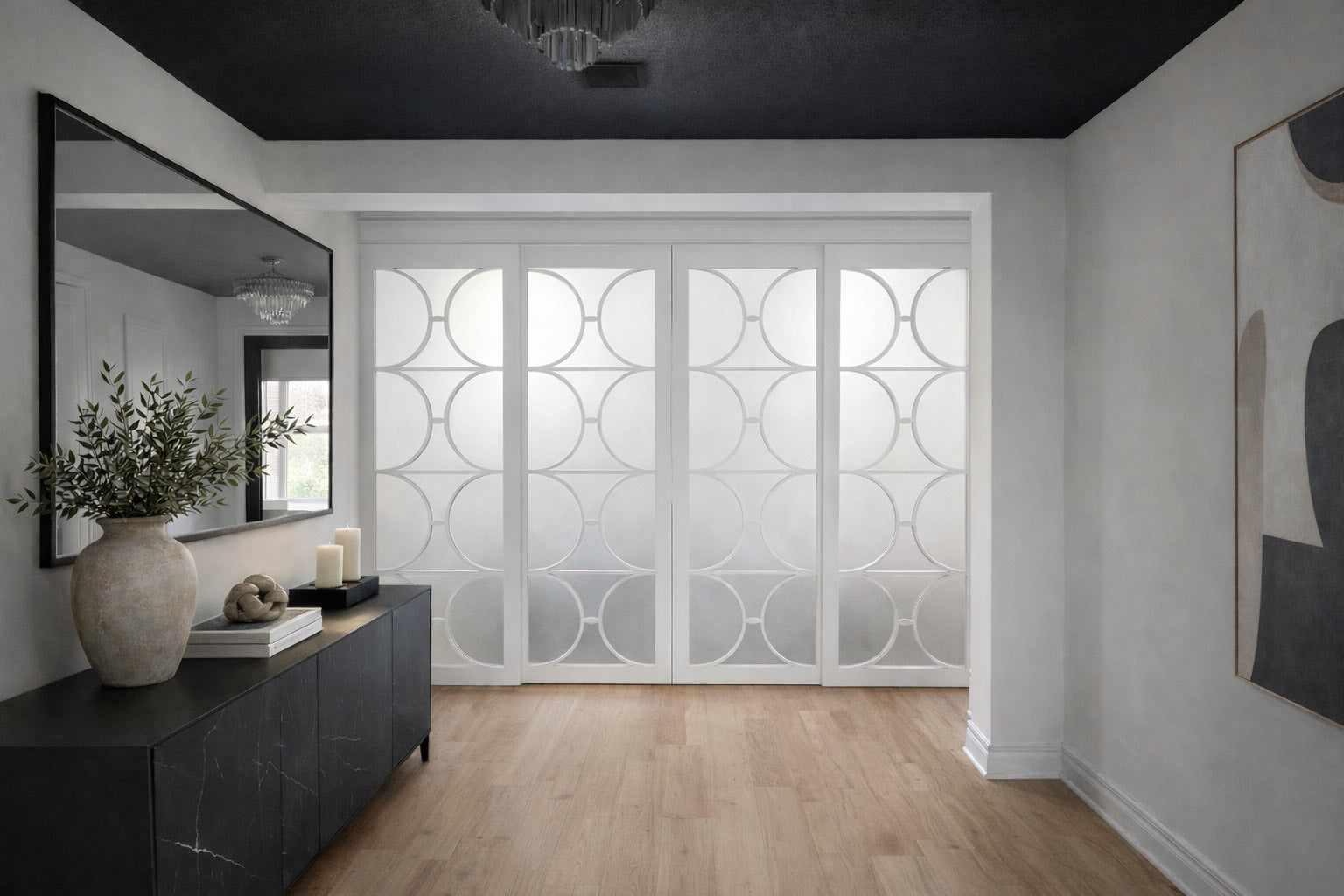 Custom modern interior door with circular geometric panel design, luxury architectural glass sliding bypass doors by Rustic Luxe Designs.