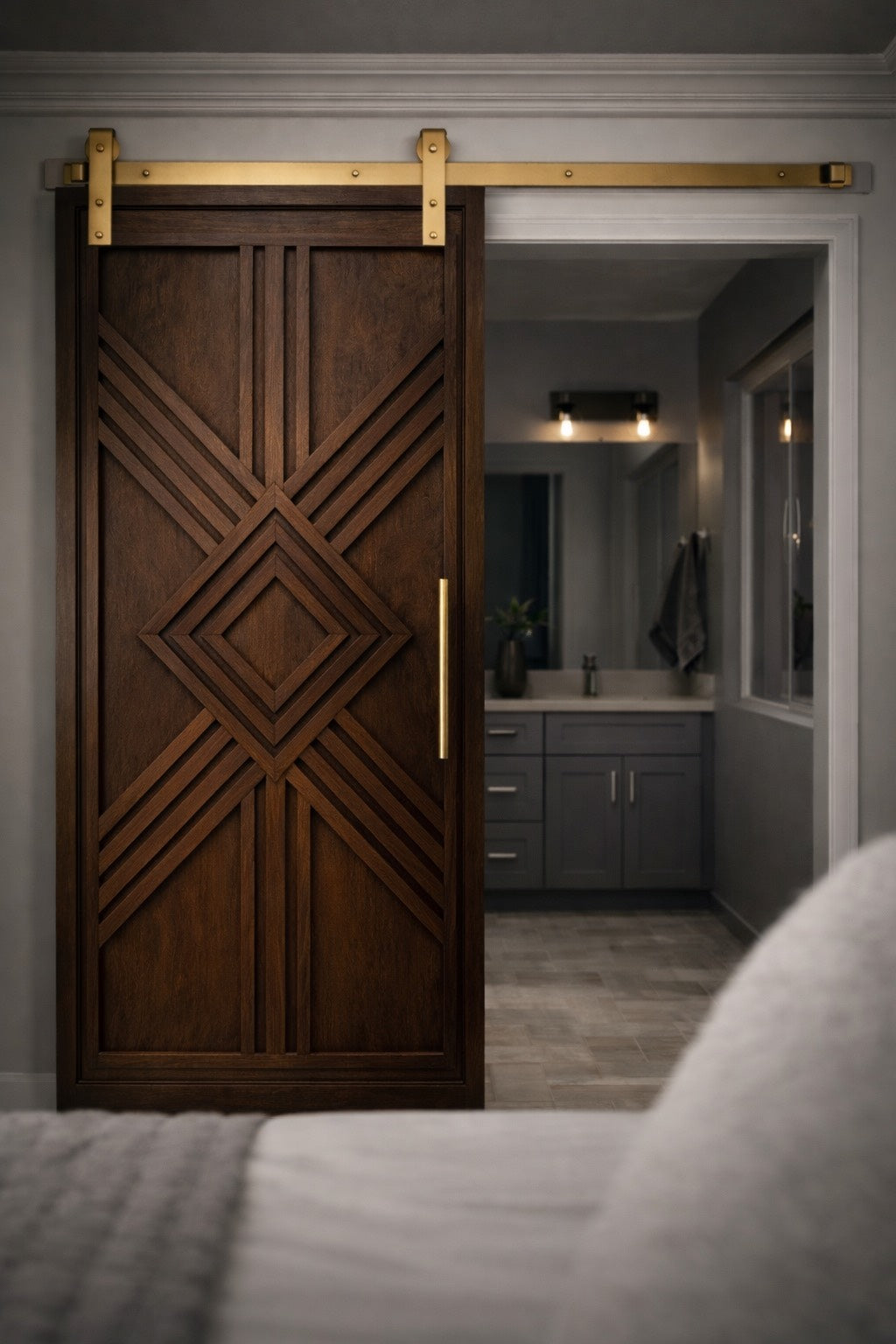 Walnut architectural sliding door with a one-of- a-kind exclusive design and modern gold door hardware by Rustic Luxe Designs