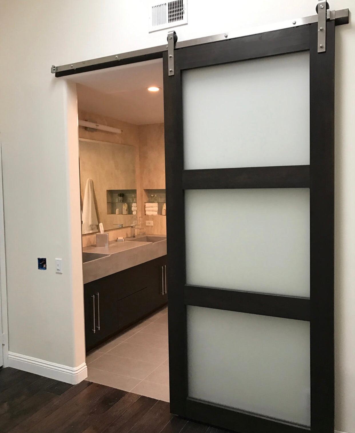 3-Panel Glass Sliding Barn Door in Bedroom
