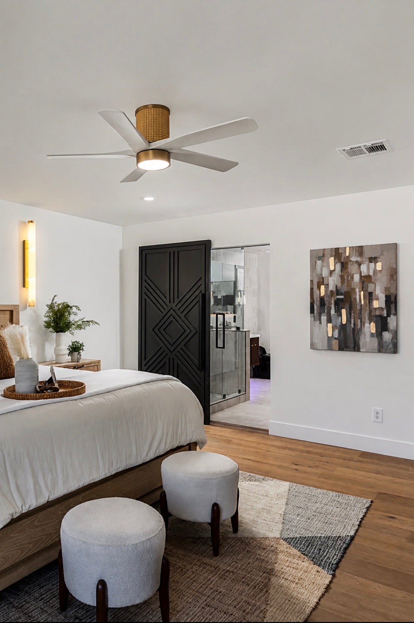 Modern primary bedroom featuring the Giza Grand black geometric sliding door
