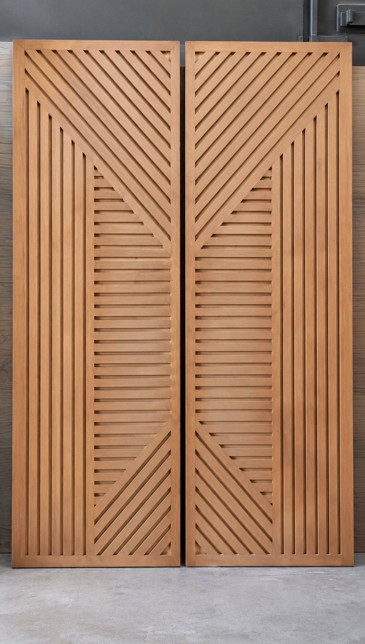 Pannello custom architectural interior doors shown in production at Rustic Luxe Designs