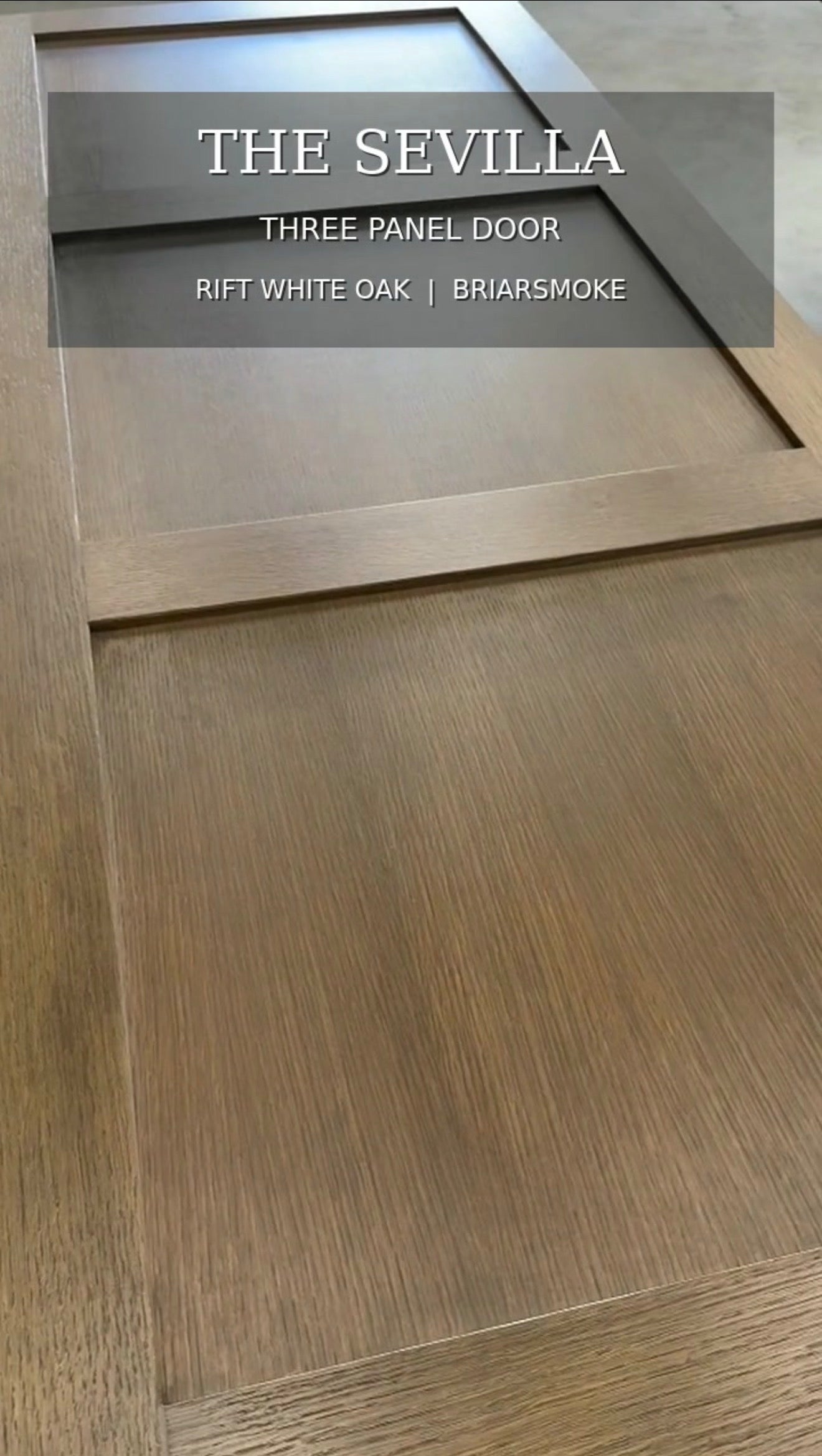Close-up video of the handcrafted Sevilla three panel interior door in rift white oak with a warm Briarsmoke stain, highlighting the linear wood grain and recessed panel details.